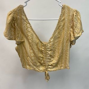 Live to be Spoiled - patterned yellow top